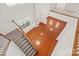 Aerial view of the foyer area with hardwood flooring and stairs leading to carpeted floors at 16631 Commons Creek Dr, Charlotte, NC 28277