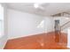 Bright and airy living room featuring hardwood floors, neutral walls, and ample natural light at 16631 Commons Creek Dr, Charlotte, NC 28277