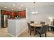 Cozy dining area with seating for four, kitchen, and neutral wall paint at 168 Limerick Rd # C, Mooresville, NC 28115