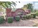 A brick and stone sign at the Woodburn community entrance at 168 Limerick Rd # C, Mooresville, NC 28115