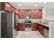 Updated kitchen features stainless steel appliances and granite countertops at 168 Limerick Rd # C, Mooresville, NC 28115