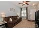 Cozy living room with neutral walls, plush carpet, and comfortable seating at 168 Limerick Rd # C, Mooresville, NC 28115