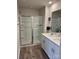 Modern bathroom featuring a double vanity and a spacious glass-enclosed shower at 1843 Old Rivers Rd # 209, Concord, NC 28027