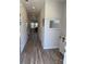 Welcoming entryway with wood-look flooring, recessed lighting, and a view leading into the living spaces at 1843 Old Rivers Rd # 209, Concord, NC 28027