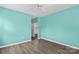 Bright bedroom with hardwood floors and a ceiling fan at 19725 Deer Valley Dr, Cornelius, NC 28031