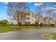 A charming apartment building with well-maintained landscaping and cozy balconies at 19725 Deer Valley Dr, Cornelius, NC 28031