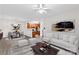 A bright living room and dining area with a ceiling fan and modern decor at 19725 Deer Valley Dr, Cornelius, NC 28031