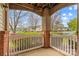 Covered porch with brick pillars and views at 19725 Deer Valley Dr, Cornelius, NC 28031