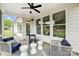 Screened-in porch with stylish outdoor seating perfect for relaxing and entertaining at 2009 Autumn Dr # 2, Monroe, NC 28110
