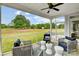 Comfortable screened-in porch with wicker seating and view of spacious backyard at 2009 Autumn Dr # 2, Monroe, NC 28110