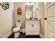 Powder room featuring modern fixtures, hexagon floor tiles, and light neutral wall colors at 2009 Autumn Dr # 2, Monroe, NC 28110