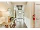 Elegant entryway with hardwood floors, stylish console table, and a decorative mirror at 2009 Autumn Dr # 2, Monroe, NC 28110