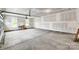 Large unfinished garage with concrete floor and two windows at 2009 Autumn Dr # 2, Monroe, NC 28110