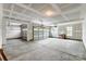 Spacious unfinished three car garage with ample room for vehicles and storage at 2009 Autumn Dr # 2, Monroe, NC 28110