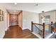 Second floor hallway featuring dark wood floors, and a view to the lower floor at 2009 Autumn Dr # 2, Monroe, NC 28110