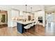 Spacious kitchen featuring a large island with seating, white cabinets, and stainless steel appliances at 2009 Autumn Dr # 2, Monroe, NC 28110