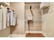 Well-organized walk-in closet featuring custom shelving and hanging space for optimal storage at 2009 Autumn Dr # 2, Monroe, NC 28110
