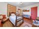 Inviting bedroom with hardwood floors, cozy textiles, and ample space at 208 Park Ave, Wadesboro, NC 28170