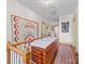Upstairs hallway with cedar chest and decorative textiles at 208 Park Ave, Wadesboro, NC 28170