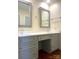Bathroom featuring granite countertops, double vanity and modern mirrors at 211 Worthington St, Shelby, NC 28150