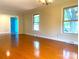 Bright living room with hardwood floors, fresh paint, and lots of natural light at 211 Worthington St, Shelby, NC 28150