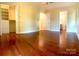 Spacious main bedroom features hardwood floors, closet, and ensuite access at 211 Worthington St, Shelby, NC 28150