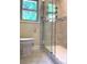 Bathroom showcasing a remodeled glass-enclosed shower and modern toilet at 211 Worthington St, Shelby, NC 28150