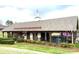 Quaint Mickey Shull Izzi Rotary Train Depot with covered porch and well-maintained landscaping at 211 Worthington St, Shelby, NC 28150