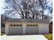 Detached two-car garage with durable siding and convenient driveway access at 215 E K St, Newton, NC 28658