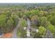 Ariel view showing the home, long driveway, and greenery at 2600 Gemway Dr, Charlotte, NC 28216