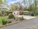 Attractive single-story home featuring neutral siding, a well-kept lawn and mature landscaping at 2600 Gemway Dr, Charlotte, NC 28216
