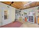 Functional laundry room area with washer, dryer, utility sink, and exterior access at 2600 Gemway Dr, Charlotte, NC 28216