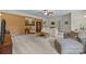 Bright living room with exposed brick and neutral furniture, offering plenty of space at 2600 Gemway Dr, Charlotte, NC 28216