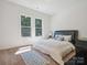 Cozy bedroom with plush bedding, natural light, and comfortable carpet at 2751 Collaroy Rd, Waxhaw, NC 28173