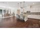 Bright, open kitchen features granite countertops, stainless appliances, and is open to the dining area at 2751 Collaroy Rd, Waxhaw, NC 28173