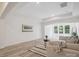 Spacious living room featuring neutral decor and multiple windows for ample natural light at 2751 Collaroy Rd, Waxhaw, NC 28173