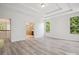 Spacious main bedroom with large windows and an en-suite bathroom featuring a glass-door shower at 2751 Collaroy Rd, Waxhaw, NC 28173