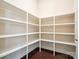 Walk-in pantry with white shelving provides generous storage space at 2751 Collaroy Rd, Waxhaw, NC 28173