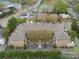An aerial view shows the community buildings with manicured greenery and convenient parking spaces at 333 Circle Ave # F, Charlotte, NC 28208
