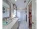 Bathroom featuring vintage mirror, vanity with sink, toilet, and decorated wallpaper at 3667 Saint Andrews Ln, Gastonia, NC 28056
