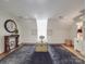 Bonus room or loft area with unique architectural details and stylish decor at 3667 Saint Andrews Ln, Gastonia, NC 28056