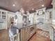 Well-equipped kitchen with an island, stainless steel appliances, and stylish decor at 3667 Saint Andrews Ln, Gastonia, NC 28056