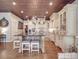 Spacious kitchen featuring a large central island with seating and custom cabinetry at 3667 Saint Andrews Ln, Gastonia, NC 28056