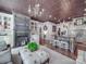 Open-concept living room adjacent to the kitchen with a fireplace and stylish furnishings at 3667 Saint Andrews Ln, Gastonia, NC 28056