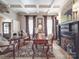 Inviting living room with decorative ceiling, ornate fireplace, and refined furnishings at 3667 Saint Andrews Ln, Gastonia, NC 28056