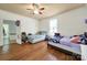 Bedroom with hardwood floors, two beds and a window at 407 Chesterfield Ave, Lancaster, SC 29720