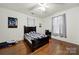 Bedroom with hardwood floors and black bedroom furniture at 407 Chesterfield Ave, Lancaster, SC 29720