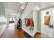 Inviting foyer with hardwood floors, staircase, and plenty of natural light at 407 Chesterfield Ave, Lancaster, SC 29720
