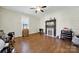Living room featuring dark wood floors and a decorative fireplace at 407 Chesterfield Ave, Lancaster, SC 29720