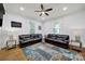 Bright living room with hardwood floors, natural light, and stylish furniture at 407 Chesterfield Ave, Lancaster, SC 29720